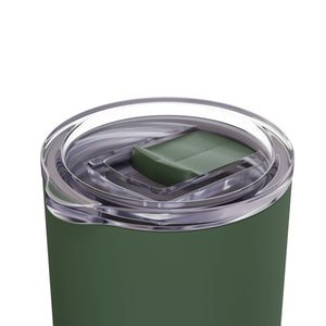 Green tumbler with a clear lid on a white background