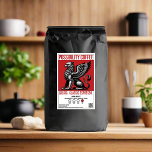 A back of Possibility Coffee Classic Espresso Dark Roasted Single Origin Small Batch Roasted Speciality Grade coffee beans on wood table in a kitchen