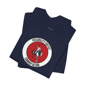 Cowboy Coffee Navy blue t-shirt with a red and white logo featuring a cowboy on a horse, on a white background.