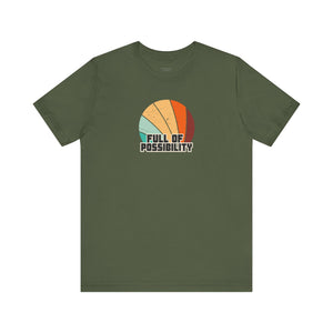 Green t-shirt with colorful graphic and 'Full of Possibility' text on a white background