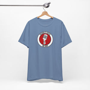 Mic Drop Blue t-shirt with a graphic design on a hanger against a white background