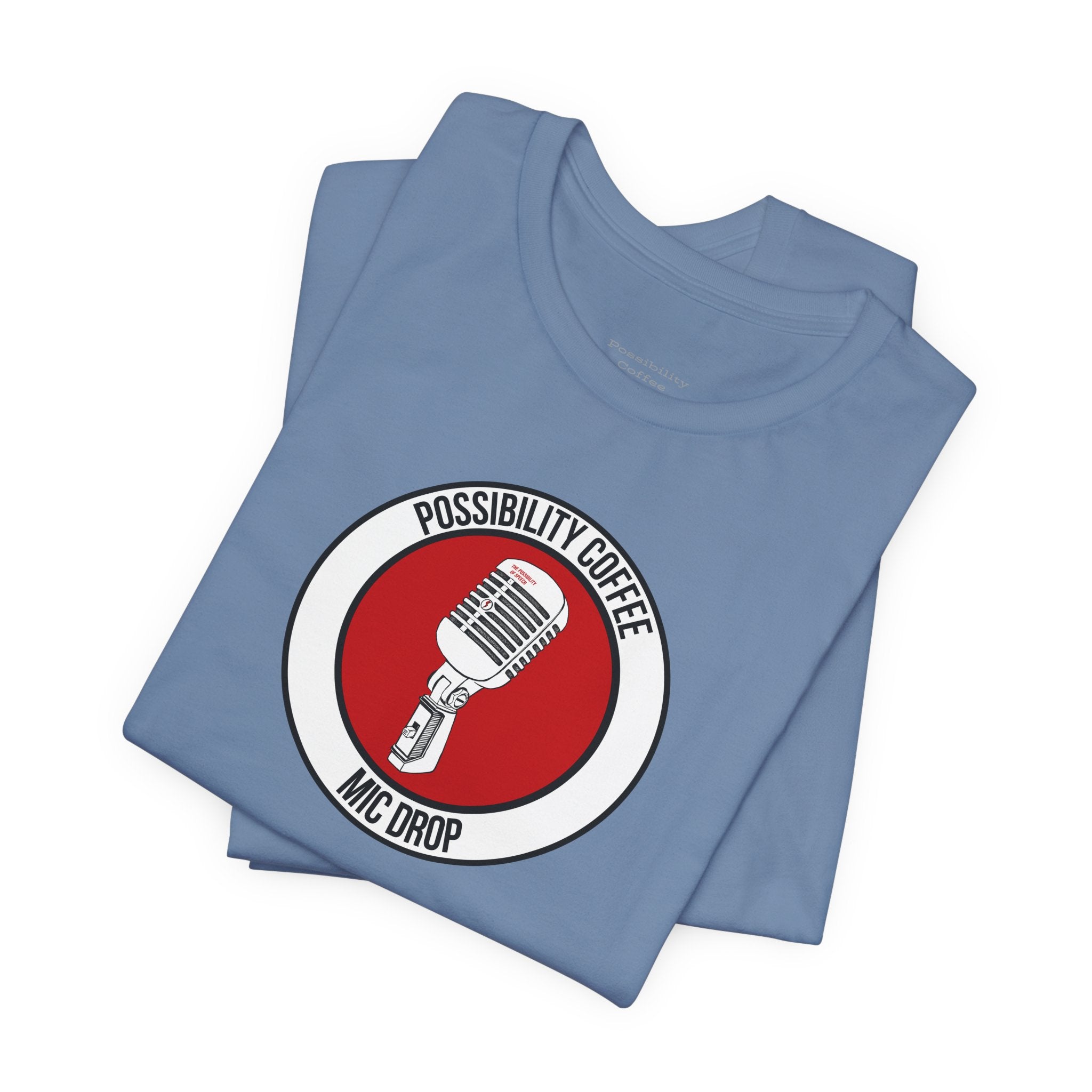 Mic Drop Folded blue t-shirt with a red and white graphic and text on a white background