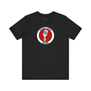 Mic Drop Black t-shirt with a red and white graphic featuring a microphone on a white background