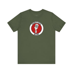 Mic Drop military Green t-shirt with a red and white logo featuring a microphone on a white background