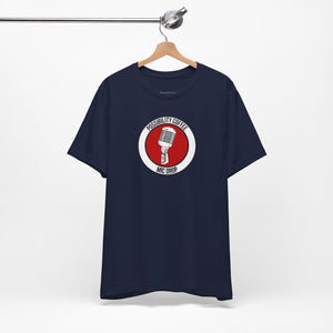 Mic Drop Navy blue t-shirt with a red and white graphic on a hanger against a white background