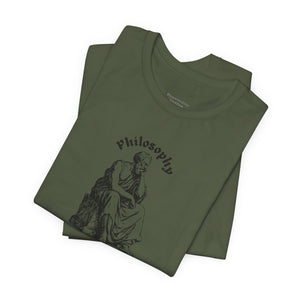 Folded green t-shirt with 'Philosophy' graphic on a white background