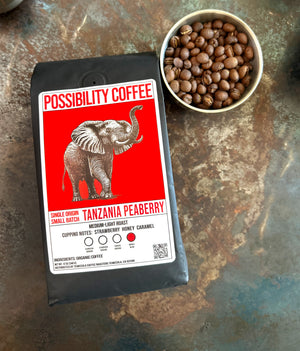 Bag of Possibility Tanzania Peaberry Single Origin Coffee on table with beans