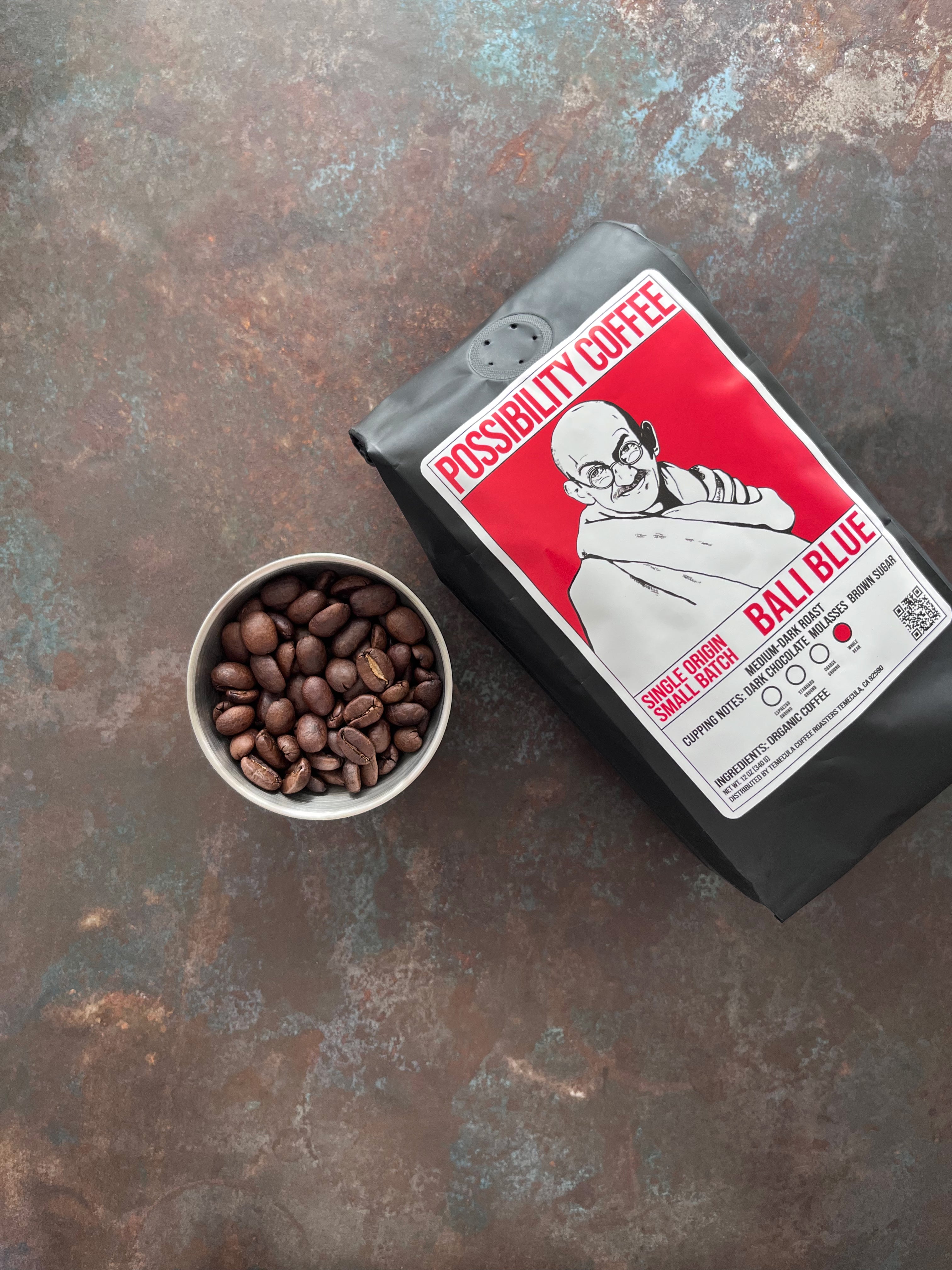 Bag of Possibility Coffee Single Origin Bali Blue on table with beans