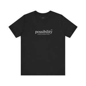 Black t-shirt with 'possibility coffee to create with' text on a white background