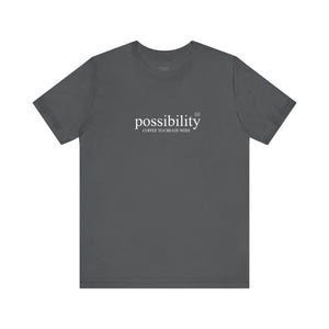 Gray t-shirt with 'possibility coffee to create with' text on a white background