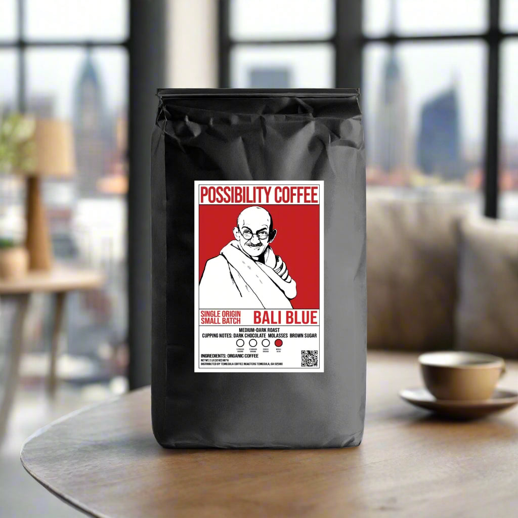 A bag of Possibility Coffee Single Origin Small batch Bali Blue Organic Coffee on wood table in living room
