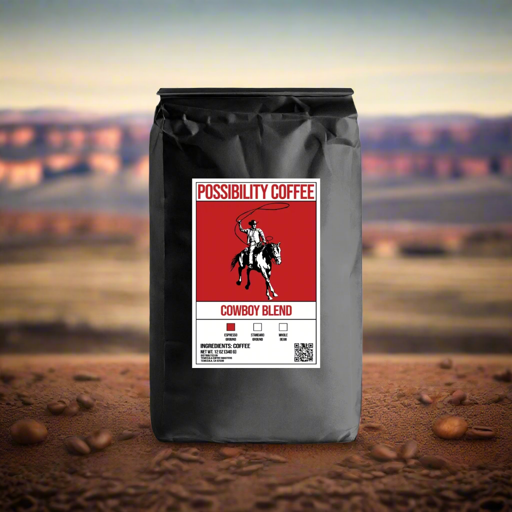 A black bag of Possibility Cowboy Blend Coffee with a western background