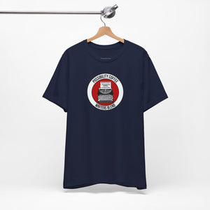 Writers Blend Typewriter Navy blue t-shirt with a graphic design on a hanger against a white background