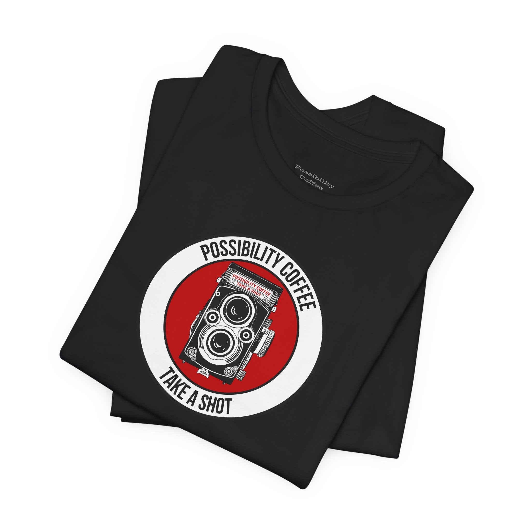 Black t-shirt with a red and white graphic and text on a white background