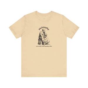 Beige t-shirt with design and text on a white background