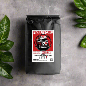 A bag of Possibility Coffee Costa Rica Small batch single origin speciality grade coffee with stone and leaf background