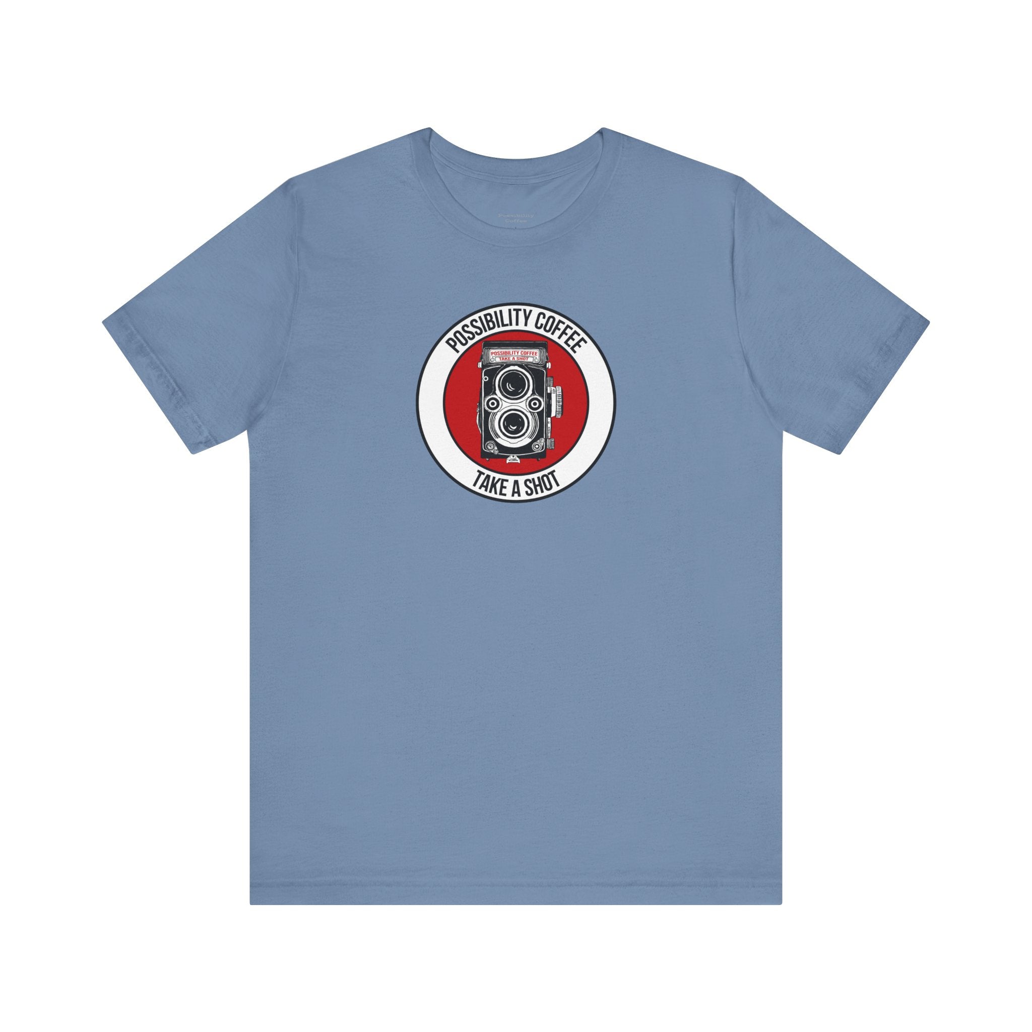 Blue t-shirt with a camera graphic and text on a white background