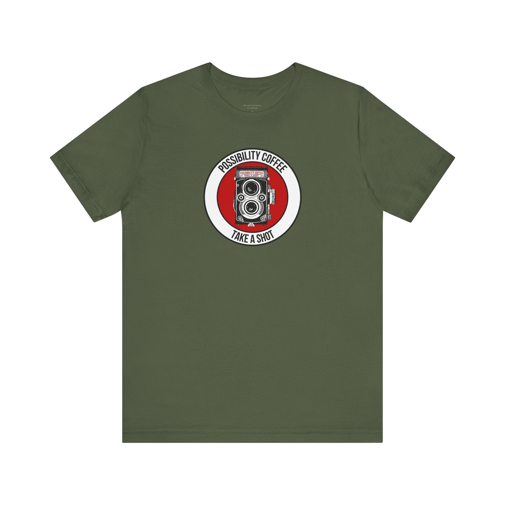 Green t-shirt with a camera graphic and text on a white background