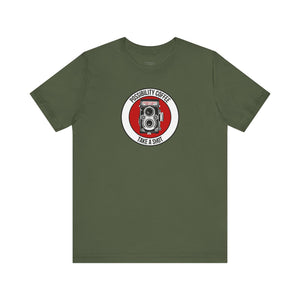 Green t-shirt with a camera graphic and text on a white background