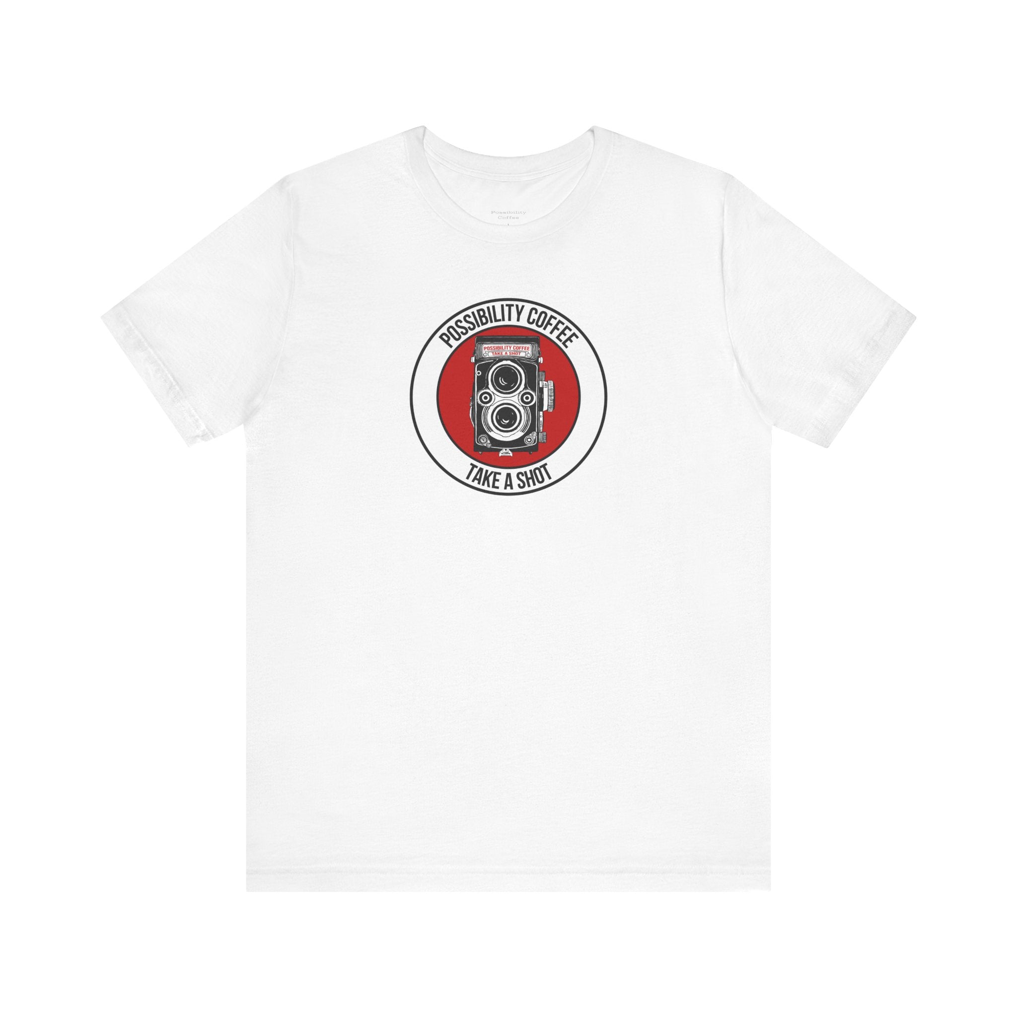 White t-shirt with a circular graphic featuring a camera and text on a white background