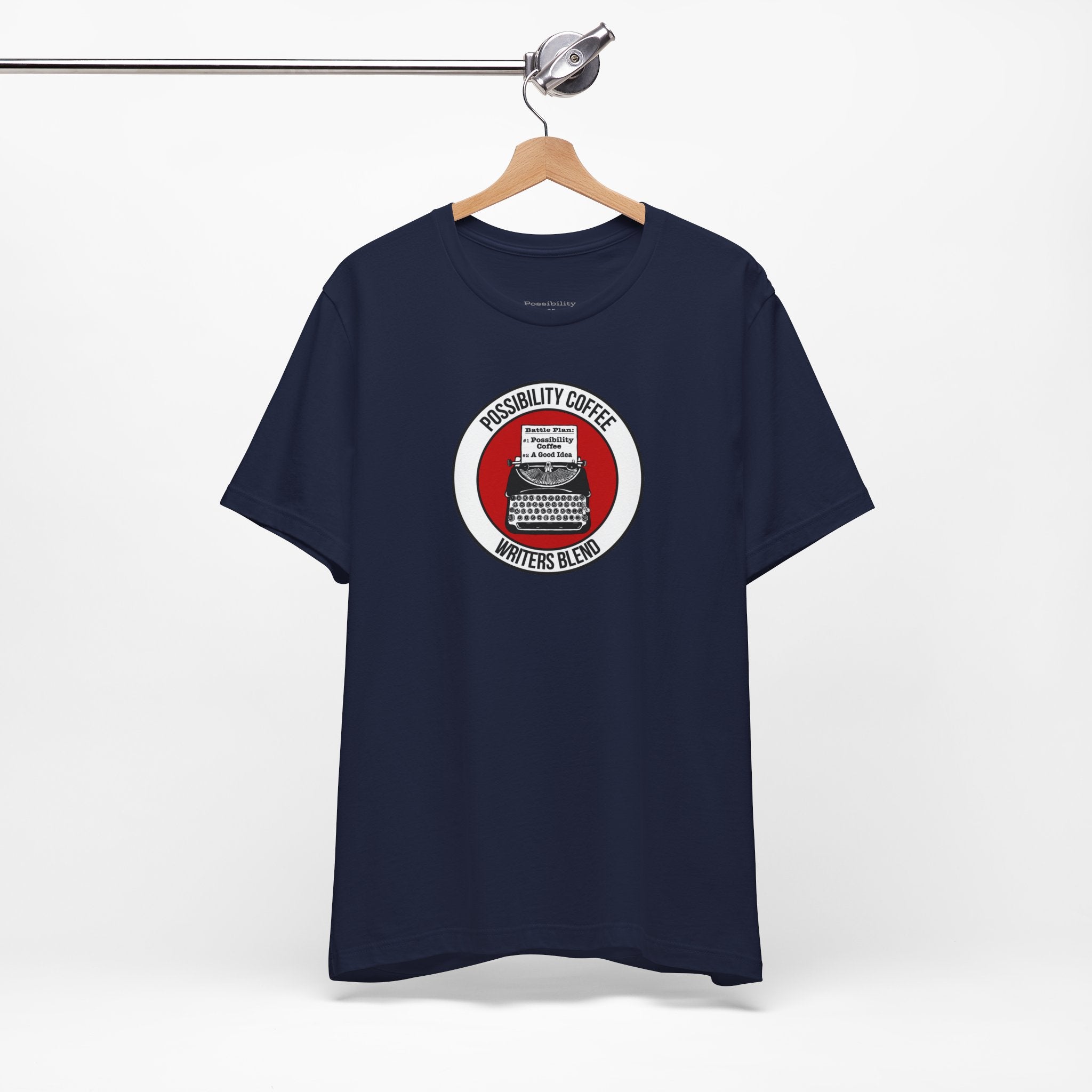 Writers Blend Typewriter Navy blue t-shirt with a graphic design on a hanger against a white background
